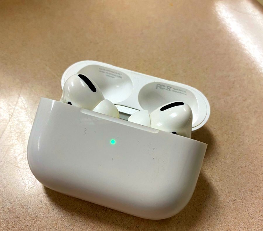 Apple Airpod Pro’s, owned by Zachary Roses, that aren’t being used in the Lakeland Journalism class. They’re laying across a desk, opened, awaiting to be used.