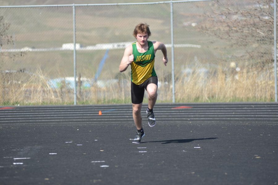 Collin Cameron starts his high jump