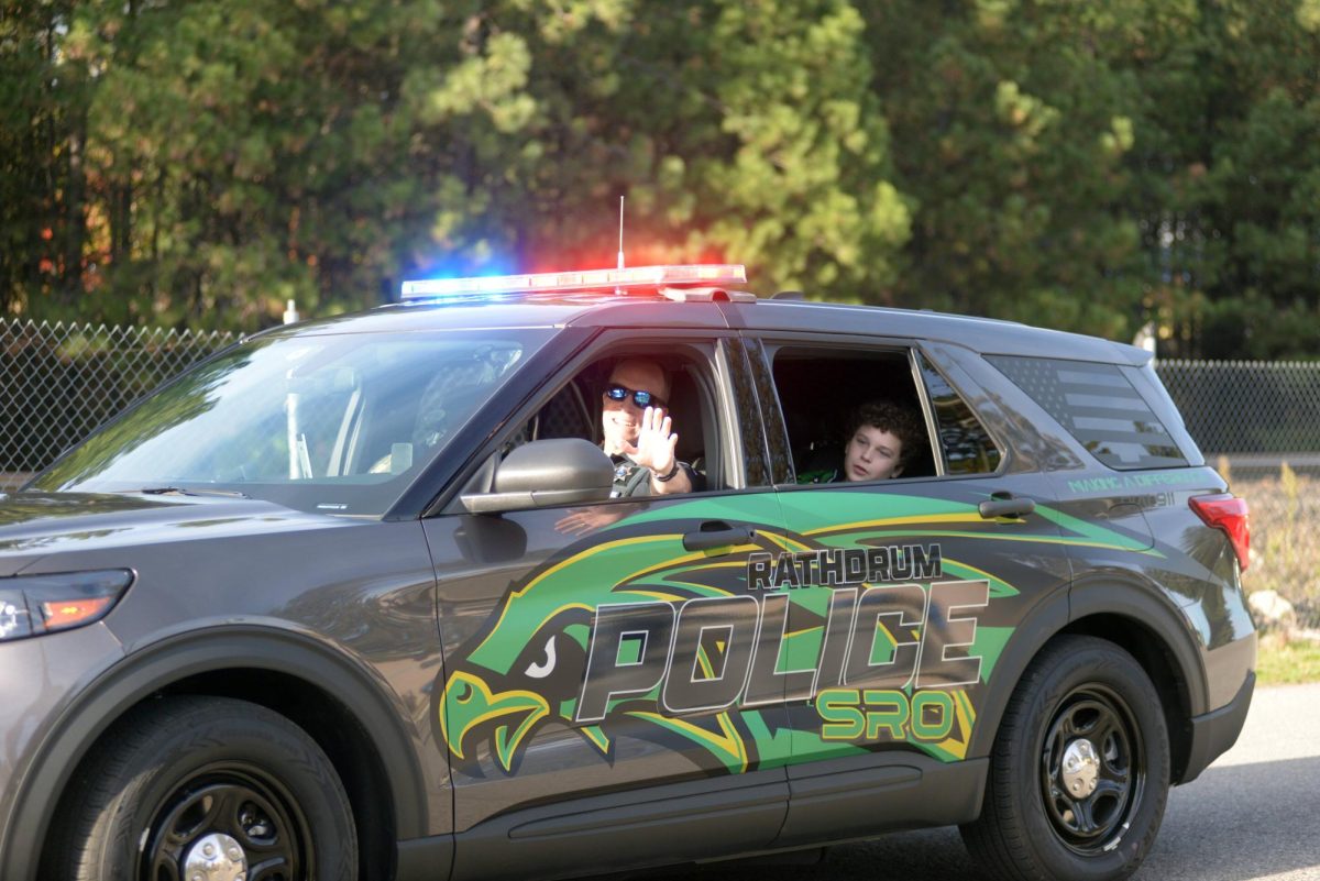 Officer Hudson opens the 2023 Homecoming Parade.