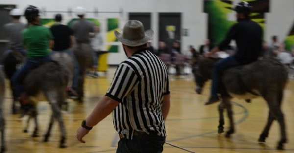 The Ref watches all the players 