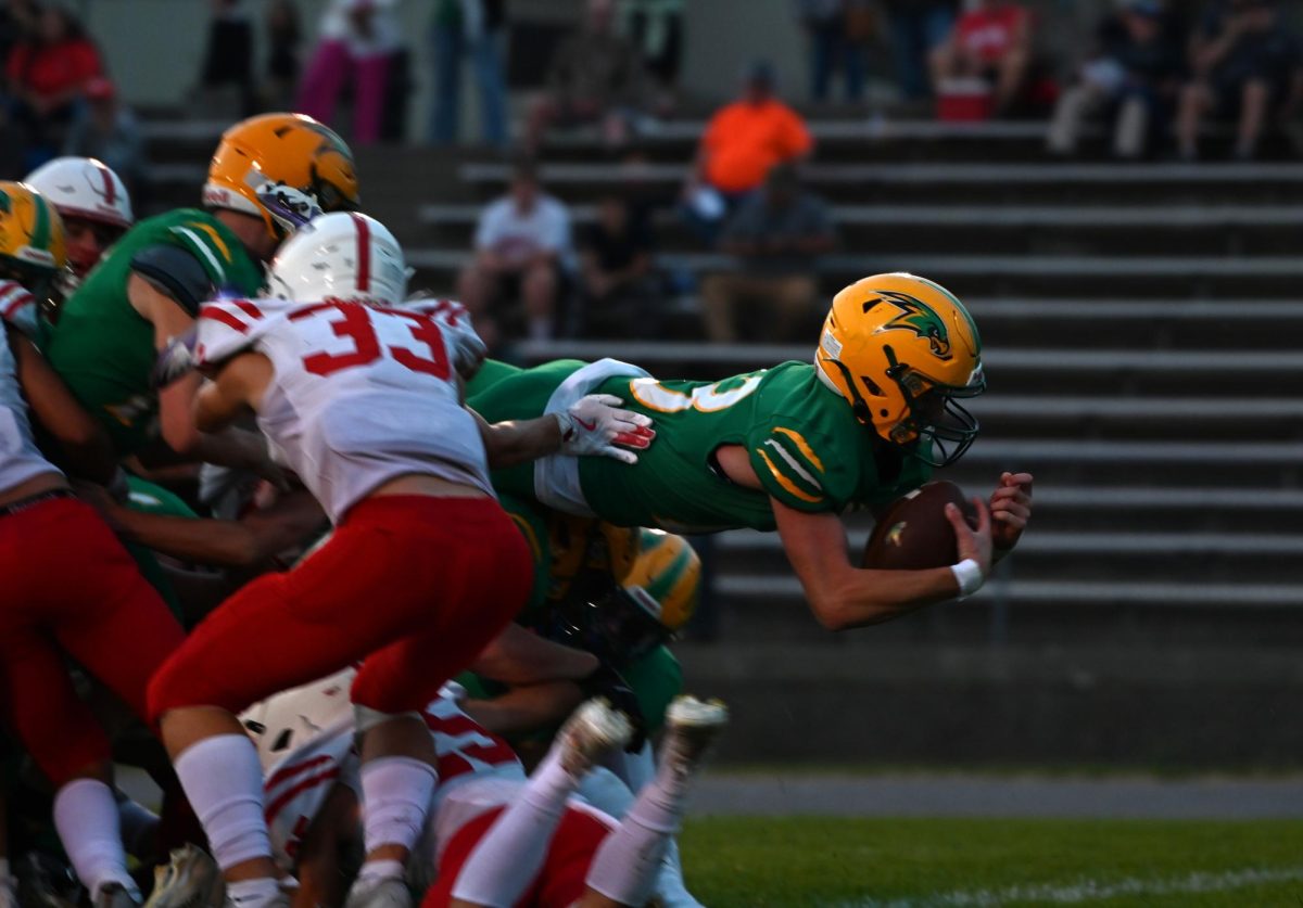 Kage Weil dives for the touchdown.