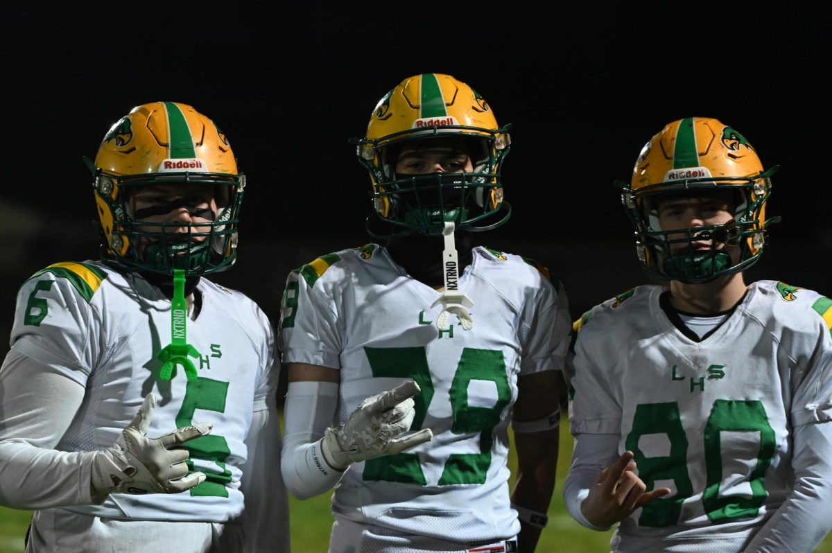 (From right to left) Cash Lund, Noah Bodak and Nate Bevacua pre-game 