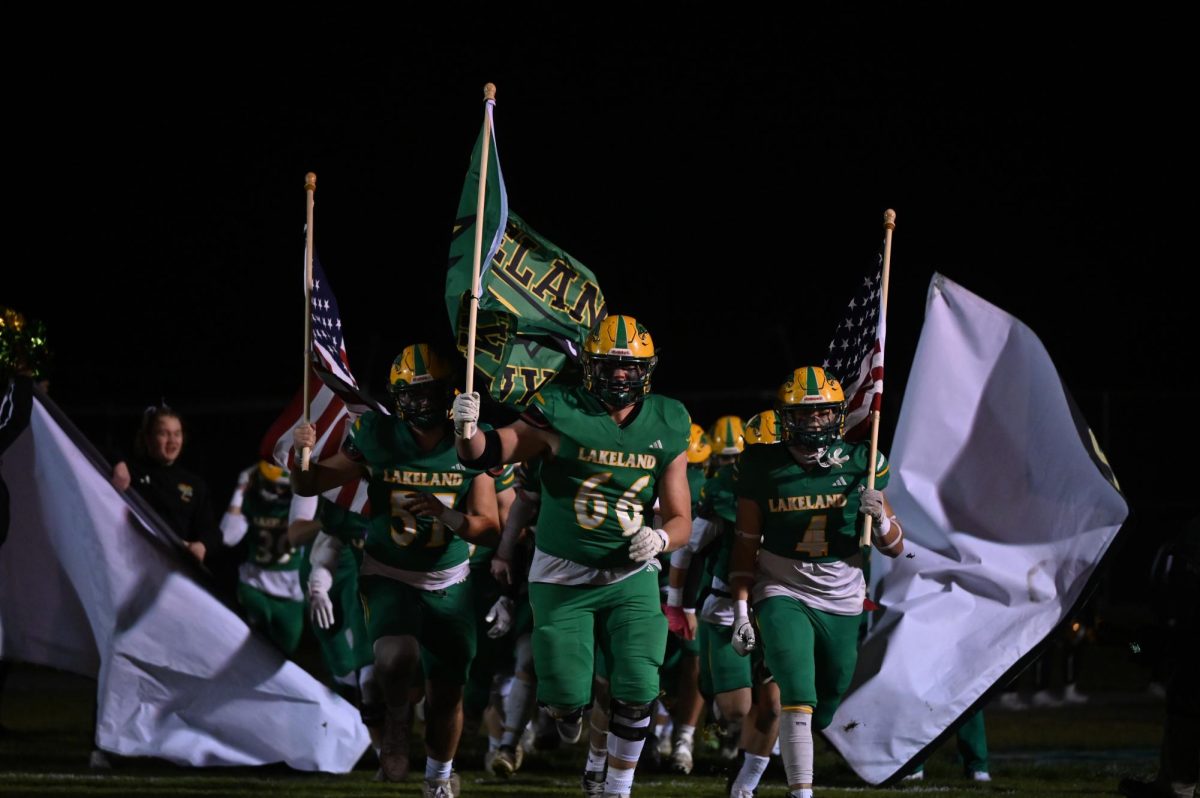 Lakeland Hawks rush out on the Field.