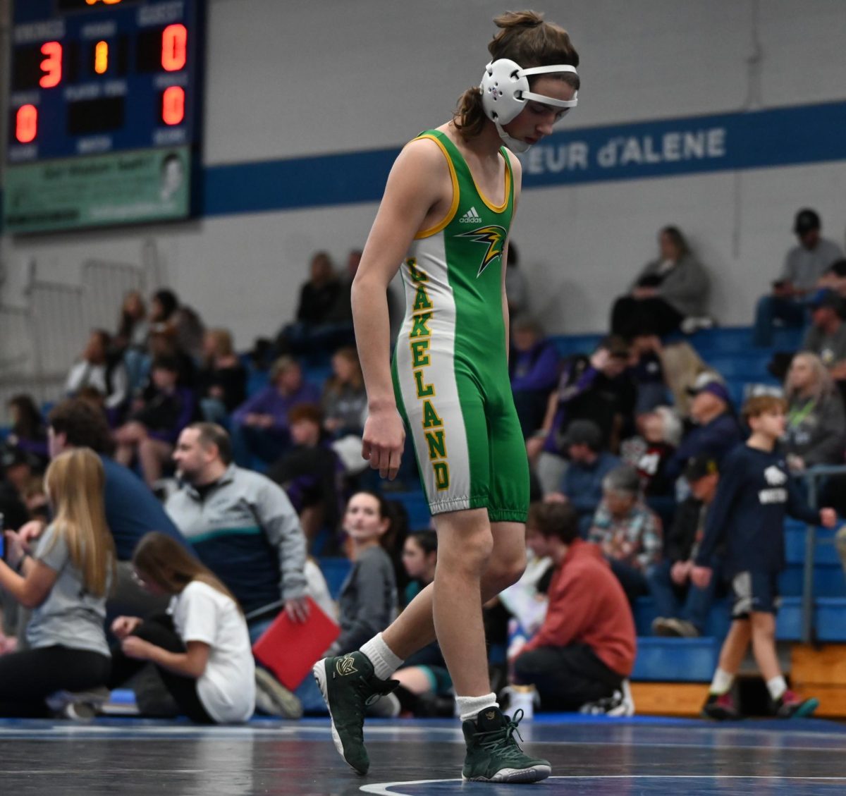 Kutter O'Brien walks onto the mat