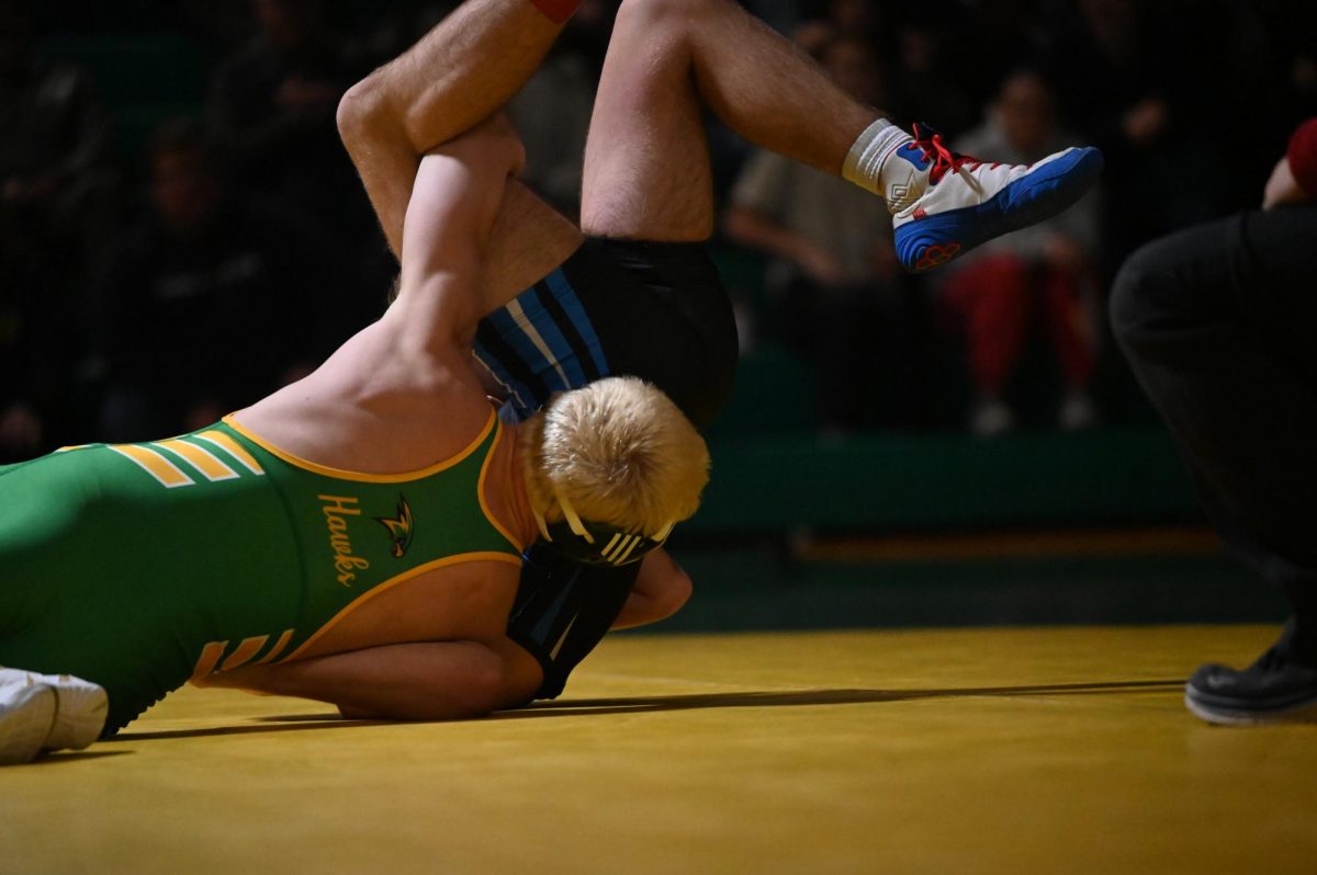 Carson Leonard goes for the pin.