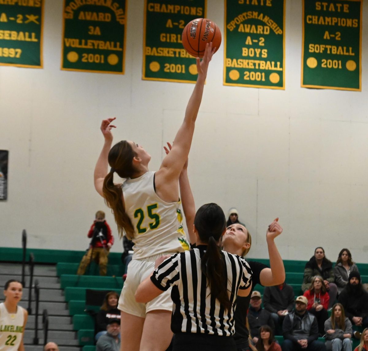 Macey Bretveld wins the tip off.