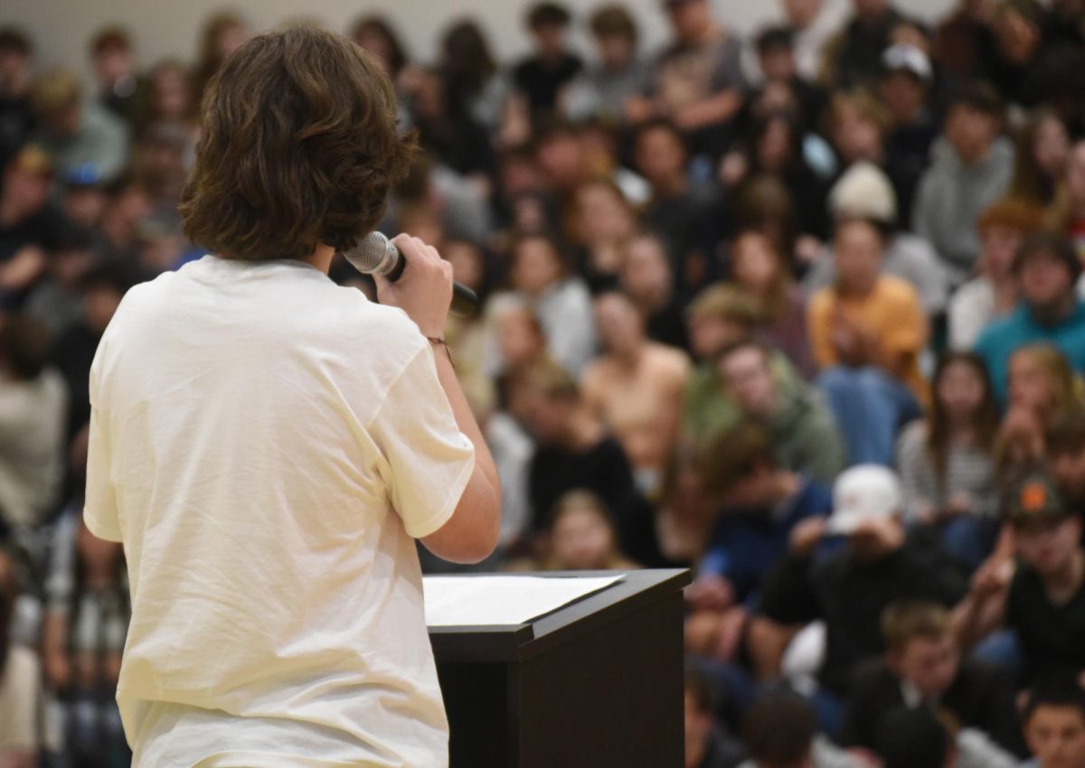 Daniel Killian speaks to the school