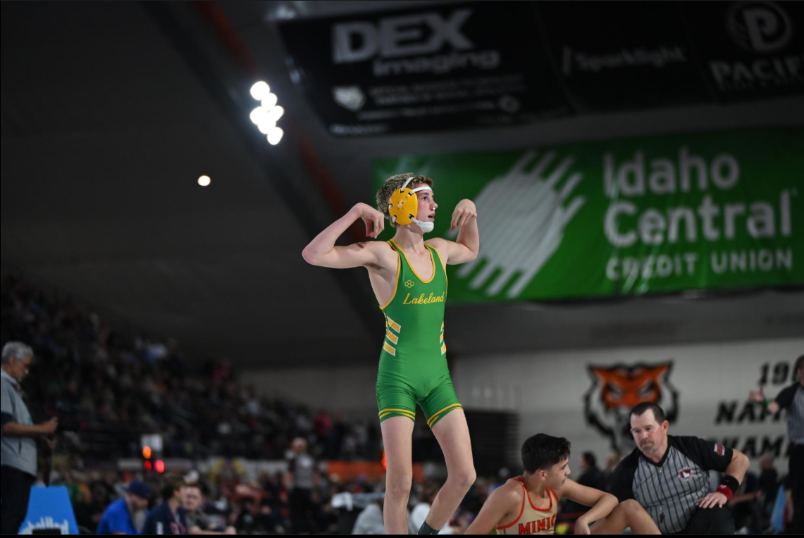 I really like this photo because it shows the emotion of beating a high seated person at state and how tired he is for working for the win