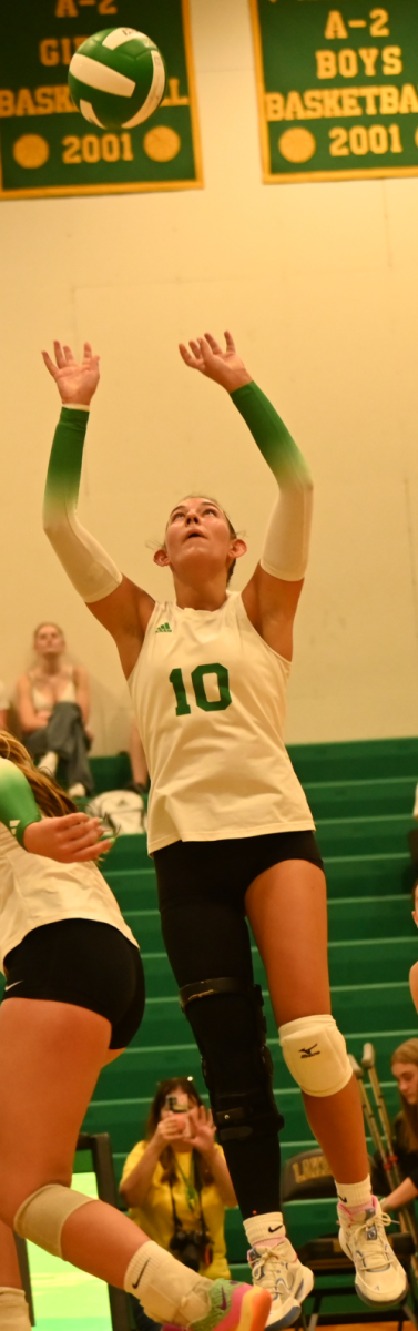 Kindell Day sets the ball during Lakeland's home game against Sept.4. The Hawks bet lake City in three sets. 