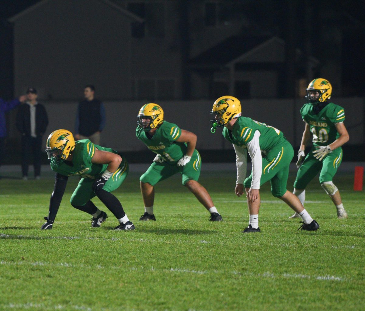 Nate Bevacqua, Will Peed, Cole Cooper, and Cash Lund Wait for the ball to be snapped during the Hawks win over the Bengals on Oct. 24