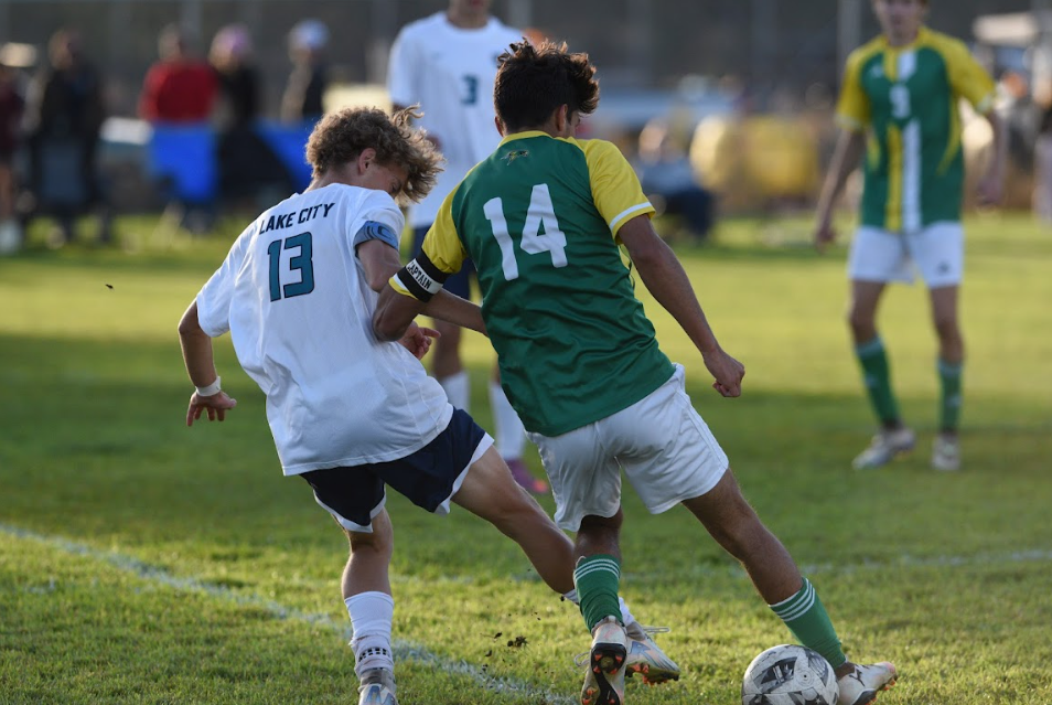 Kyle Fritz takes the ball from Lake City. 