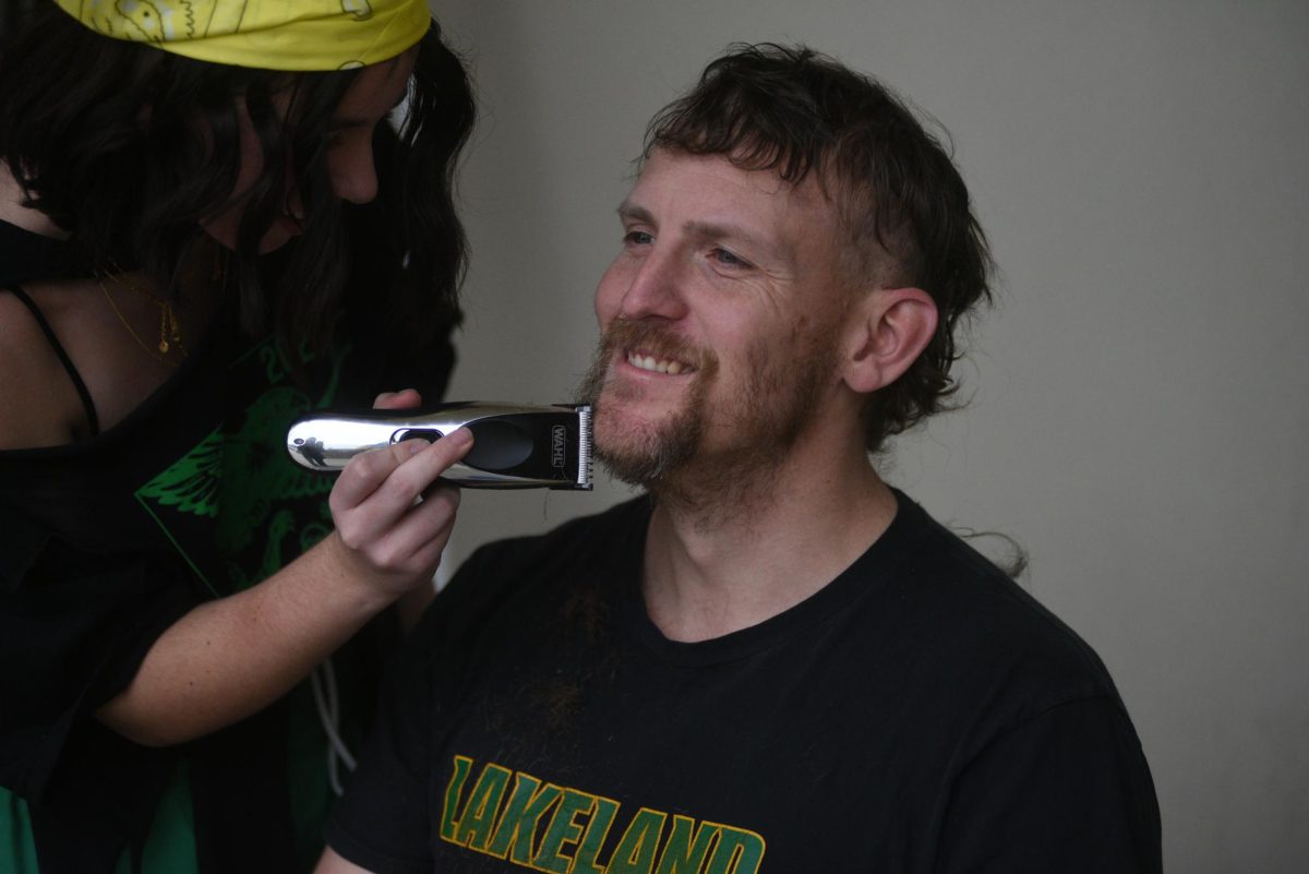 Lilly Dotson Gives Mr. Dunn and mullet and handle bar mustache  