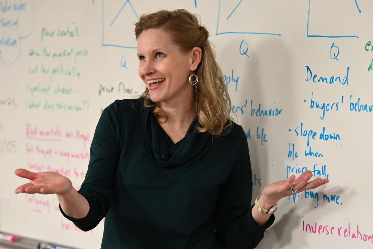 Ms. Moore teaching her Econ class