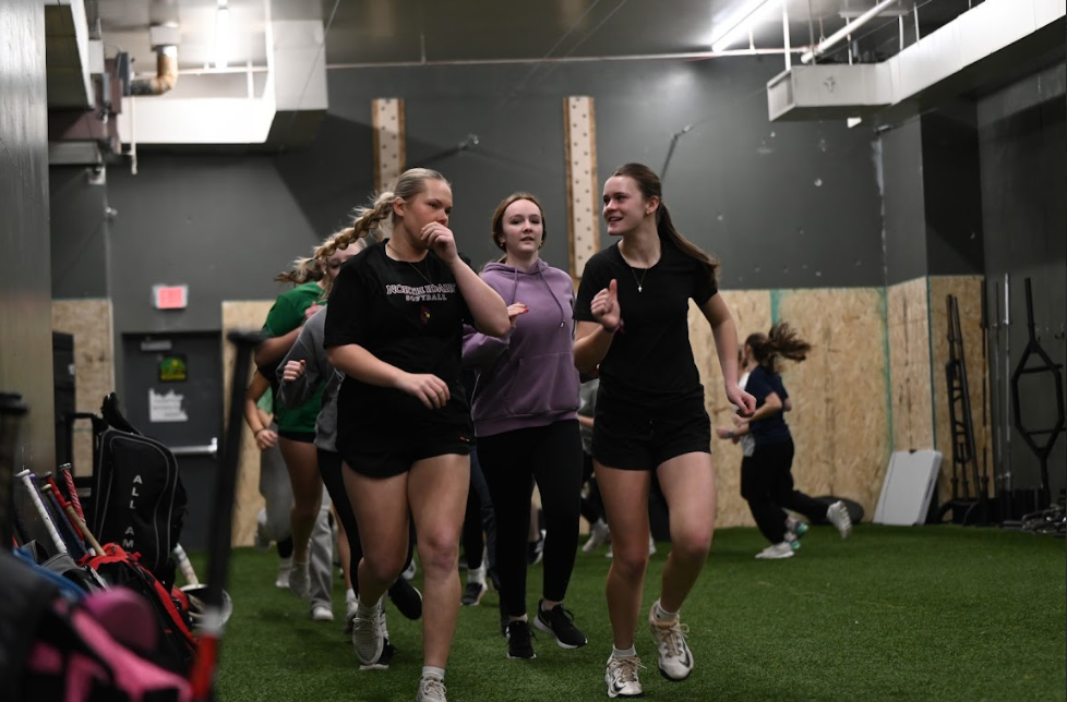 Kiersten Drake and her sister leading the warmup run