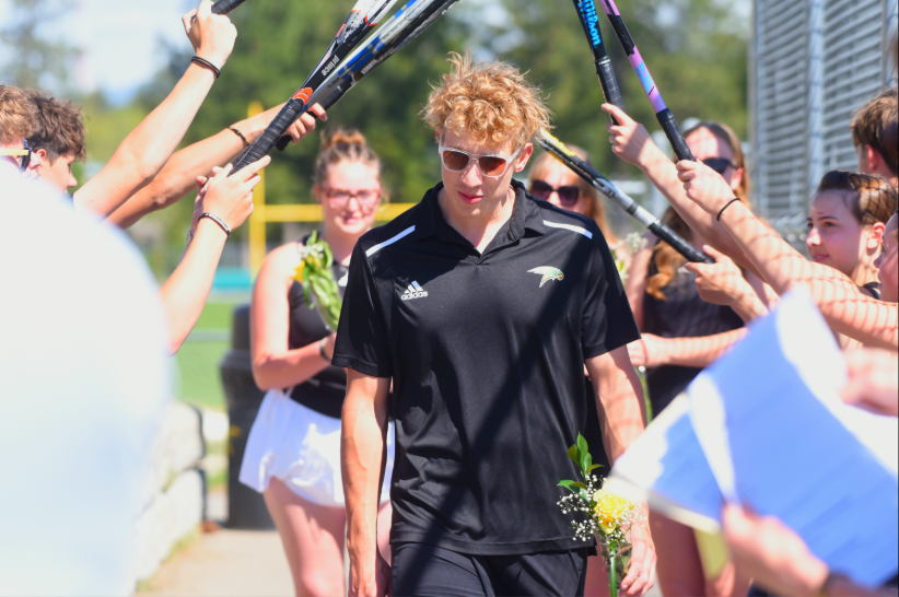 Brock Raebel walking out for senior night